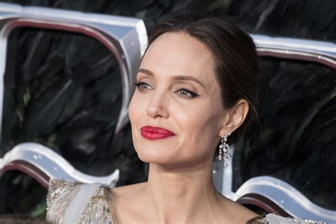 angelina jolie naked|Angelina Jolie poses nude on Harpers Bazaar cover